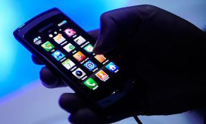 Hand holding smartphone